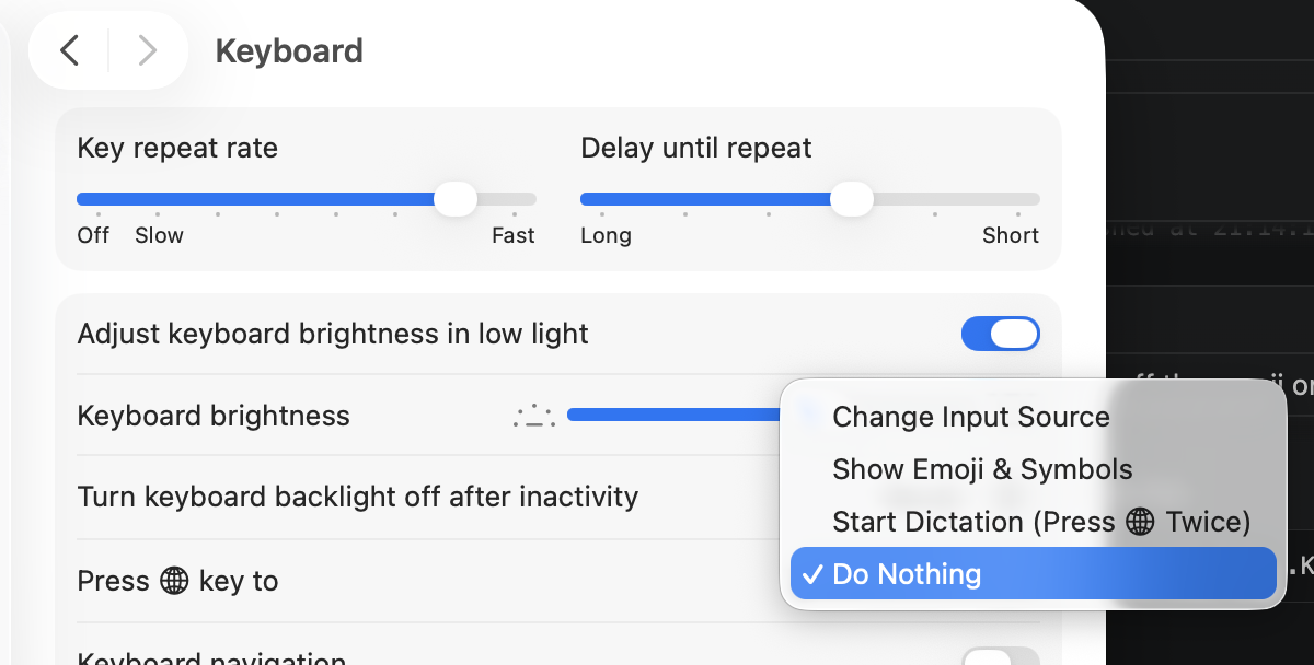 Keyboard settings showing Press globe key to dropdown with Do Nothing selected